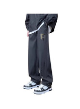 Huitich breathable outdoor pants for men in black with relaxed fit and logo detail